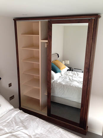 Fitted mirrored wardrobe interior shelving, handmade in Shropshire